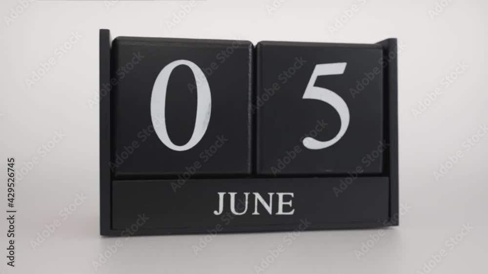 5th June World Environment day. June 5 date on black wood cube calendar.
Close up rotate wooden box with date month on white background. Slow motion zoom in and rotating. 5th June World Environment day. June 5 date on black wood cube calendar.
Close up rotate wooden box with date month on white background. Slow motion zoom in and rotating.