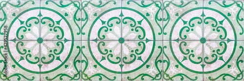 Panorama of Vintage antique white and green ceramic tile pattern texture and seamless background