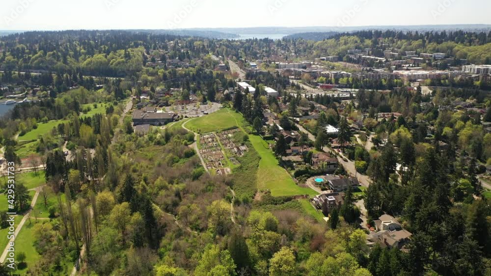 Cinematic aerial drone clip of downtown Mercer island, Beaumont, Luther Burbank Park, residential and commercial areas, luxury, beachfront homes by Lake Washington, near Seattle , King County Cinematic aerial drone clip of downtown Mercer island, Beaumont, Luther Burbank Park, residential and commercial areas, luxury, beachfront homes by Lake Washington, near Seattle , King County