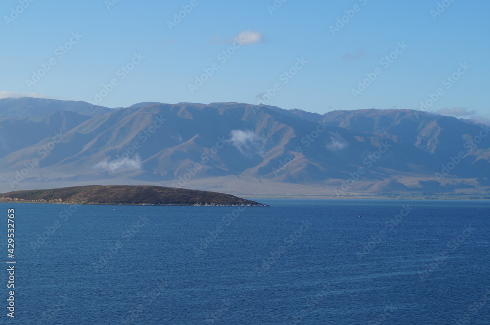 blue sea on the background of gray mountains summer morning East Kazakhstan region