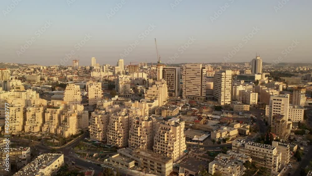 Jerusalem Center Buildings aerial view at Sunset, Israel
Drone panorama view over Jerusalem center, April 2021
Jerusalem Center Buildings aerial view at Sunset, Israel
Drone panorama view over Jerusalem center, April 2021