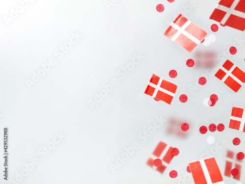 Denmark. June 5, constitution day, September 21, happy independence day, national holiday, flag foggy background. Dannebrog. Defocusing