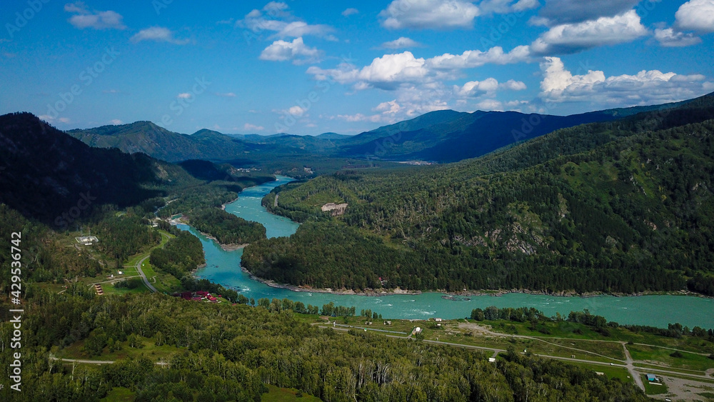 Aerial view of the Katun river valley in the mountains in summer, Altai photo from a drone Aerial view of the Katun river valley in the mountains in summer, Altai photo from a drone
