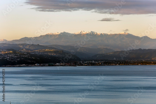 Photography Snowy mountains view from Wellington, New Zealand