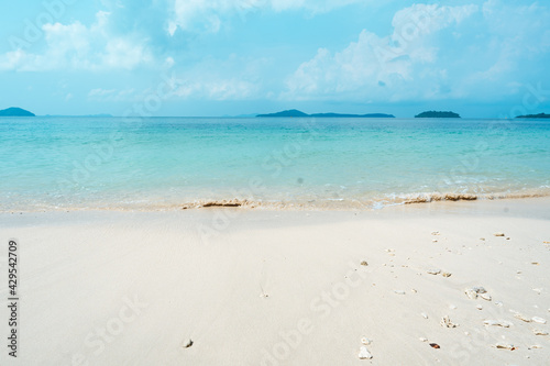 Blue sea with white beach in summer
