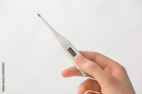 Female hand with electronic...