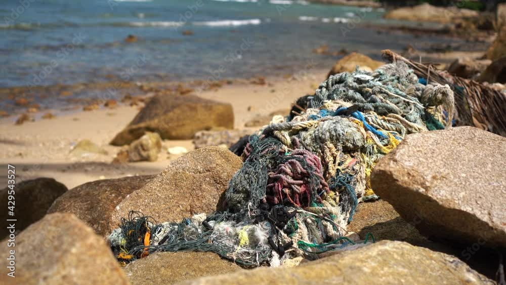 Plastic bottles trash pollution on contaminated ocean sea coast,sunset time,environmental waste. Plastic bottles trash pollution on contaminated ocean sea coast,sunset time,environmental waste.