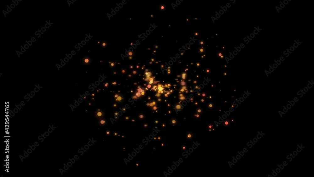 Spinning glowing particles on dark background in 4k video.