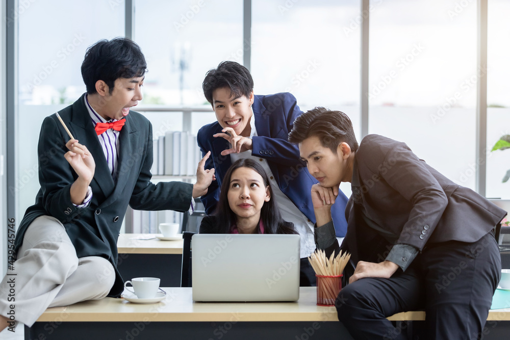 Successful Joke happy workers Group of asian business people with diverse genders (LGBT) workers with in company support in the meeting room at office Successful Joke happy workers Group of asian business people with diverse genders (LGBT) workers with in company support in the meeting room at office
