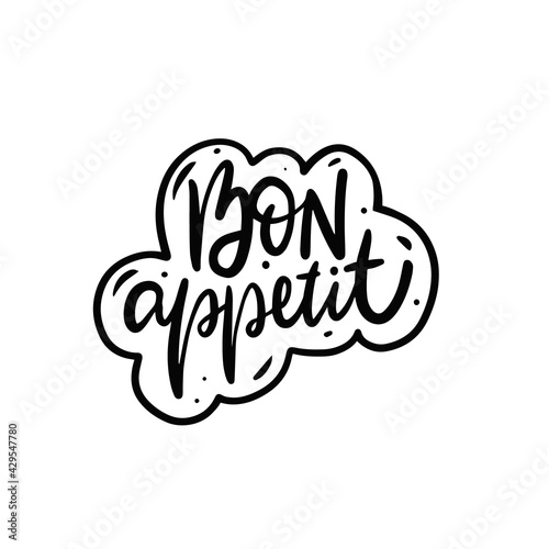 In graceful calligraphy, "Bon Appétit" adorns the space in black against a crisp white backdrop, inviting diners to enjoy their meal. A tasteful touch for any dining setting.