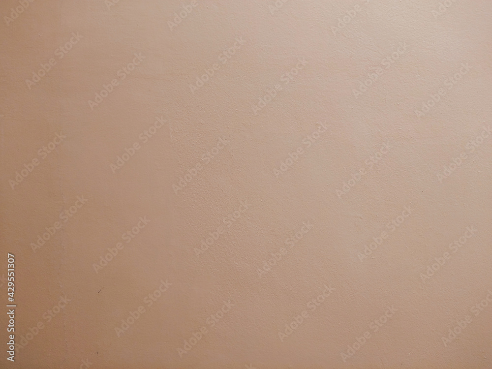 Concrete wall of champagne color background Concrete wall of champagne color background