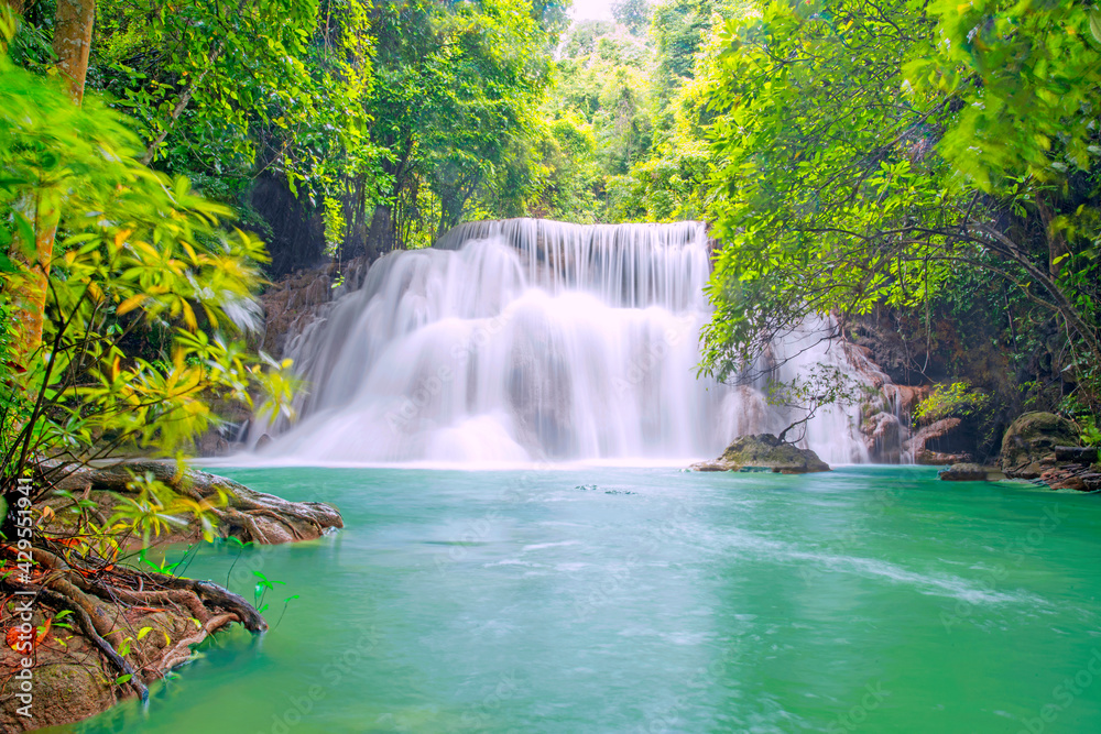 Fototapeta premium Huay Mae Khamin Waterfall, 3th floor, waterfall in the national park Beautiful landscape waterfalls in a tropical rainforest in Kanchanaburi. Thailand.