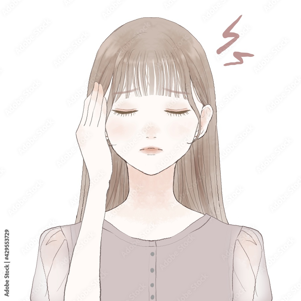 頭痛に悩まされる女性 頭痛に悩まされる女性