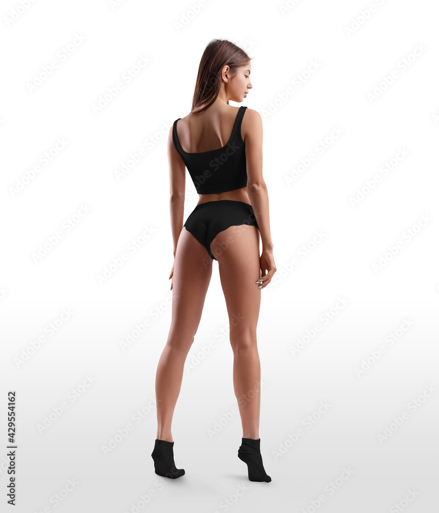 Mockup of black underwear, top and panties on the body of a young girl in socks, isolated on the background