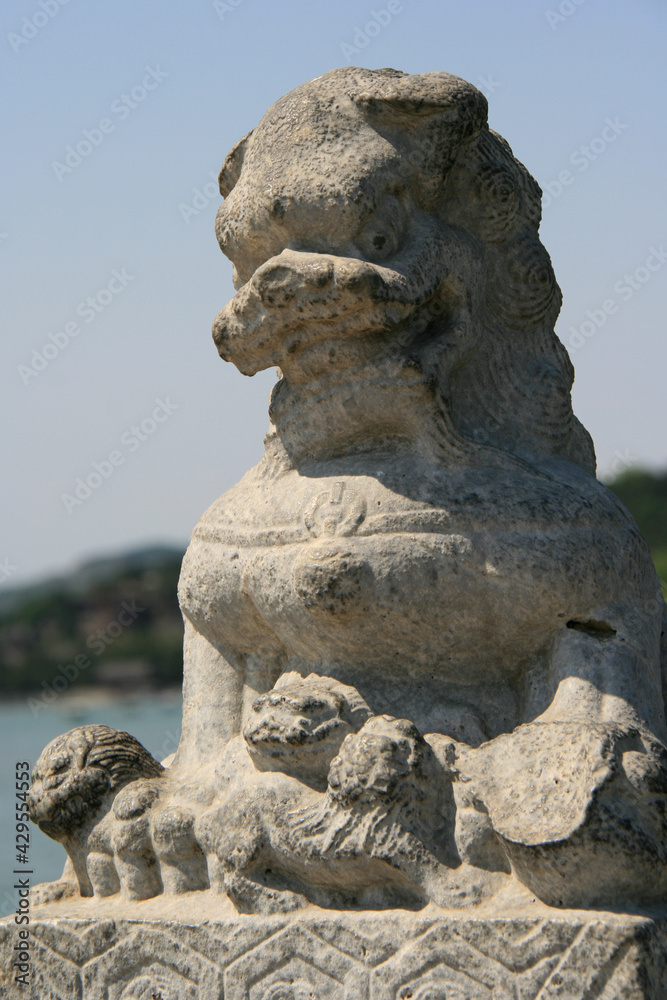 statue of a lion at the summer palace in beijing (china) statue of a lion at the summer palace in beijing (china)