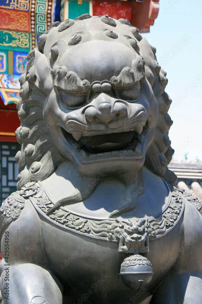 statue of lion at the summer palace in beijing (china)