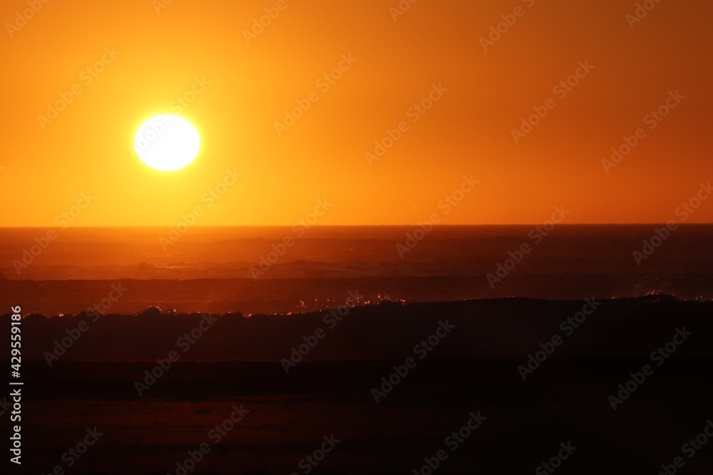 Sunset over the agitated ocean, on the skeleton coast in southern Namibia. Sunset over the agitated ocean, on the skeleton coast in southern Namibia.
