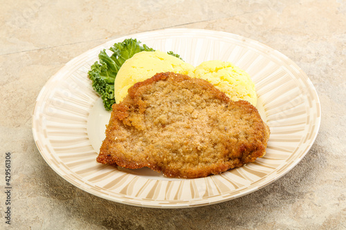 Crispy chicken schnitzel with mashed potato