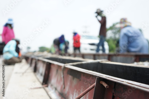 Road island construction By installing concrete formwork (blurry image)