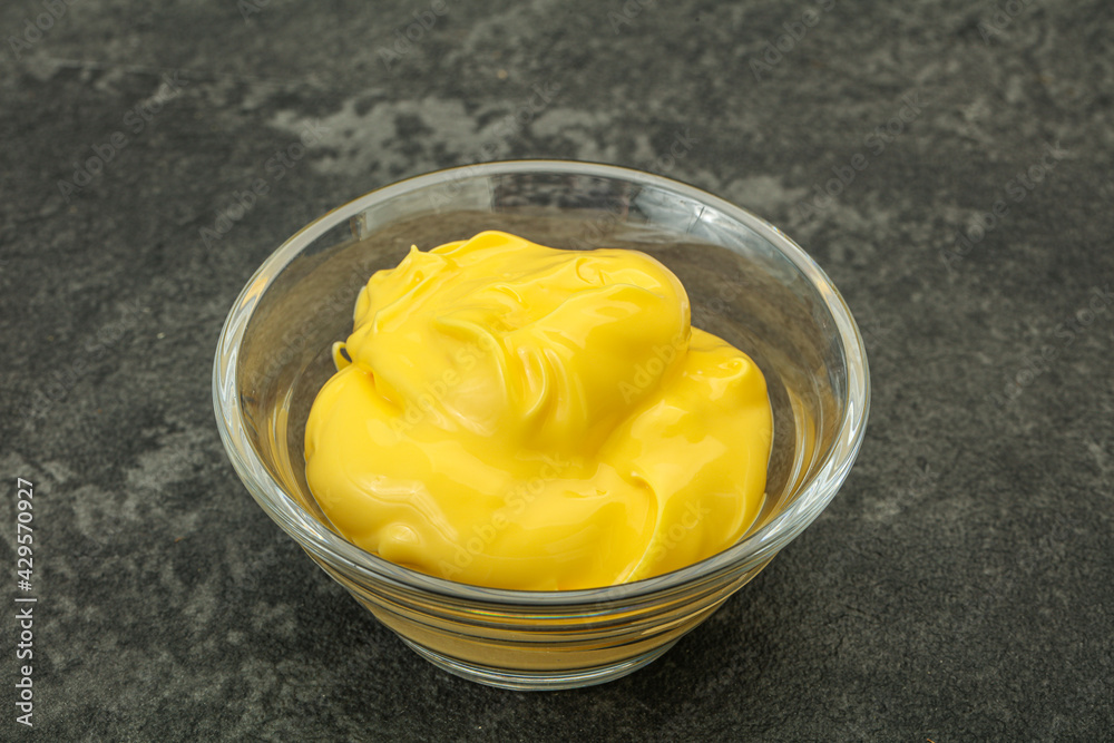 Natural cheese sauce in the bowl Natural cheese sauce in the bowl