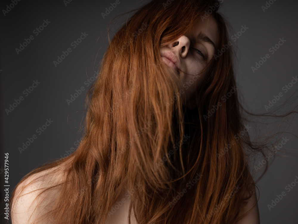 Naklejka premium Portrait of beautiful woman on gray background bare shoulders close-up cropped view