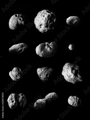 asteroids of the solar system on a black background, comparison of the sizes of different asteroids. 