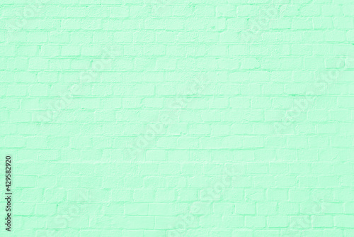 Green brick building wall. Interior of a modern loft. Background for design