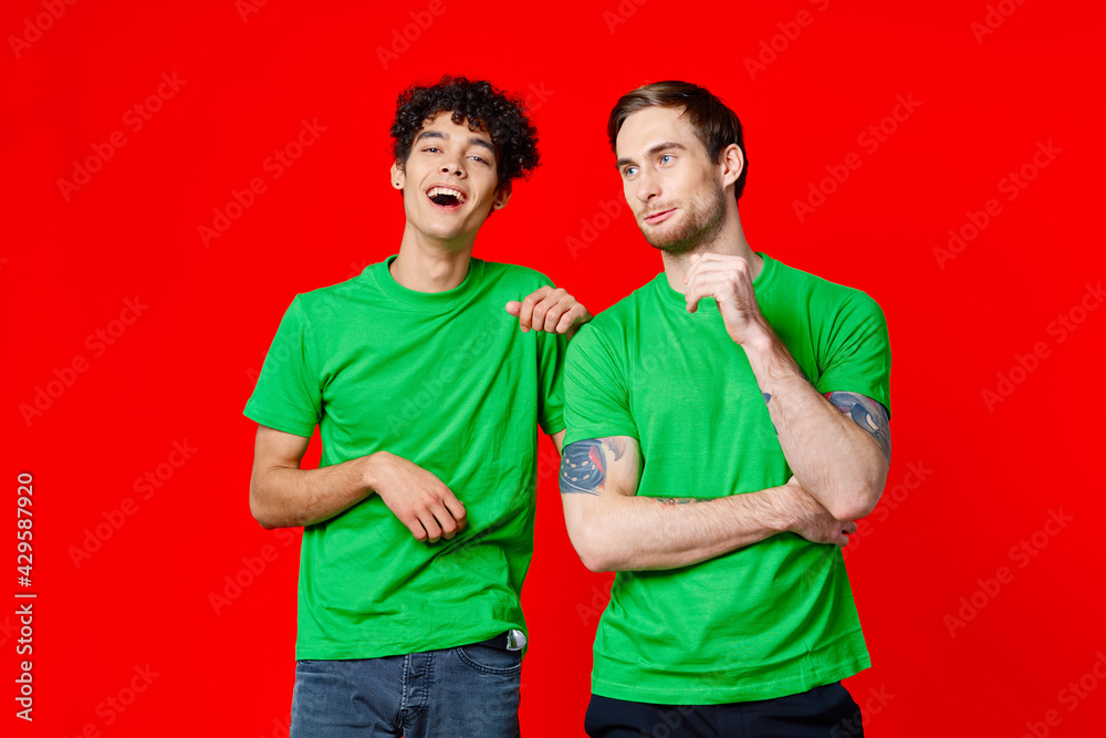 Cheerful friends laugh communication emotions red background Cheerful friends laugh communication emotions red background