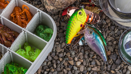 Spain.August 22, 2020.Fishing tackle - fishing spinning, lures and wobblers.Closeup of a fishing box with colorful lures.Fishing in Spain at the Mequinenza reservoir - Ebro photo