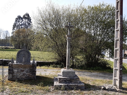 Histórica cruz de piedra o cruceiro en Goiriz, Galicia photo