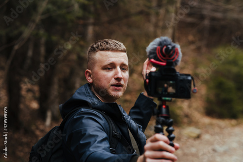 Guy shoots a blog on camera