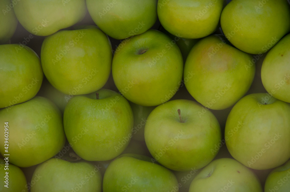 green apples forming texture and background green apples forming texture and background