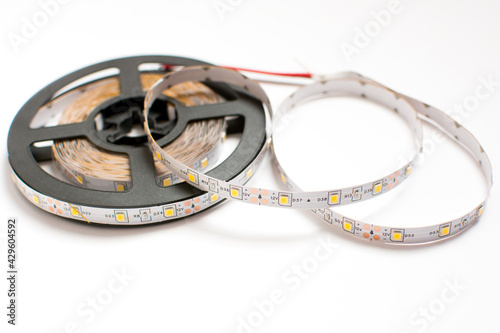 Wallpaper Mural Led strip tape roll isolated on white background. Diode as a component for home made lighting. Diy and save energy concept. Torontodigital.ca