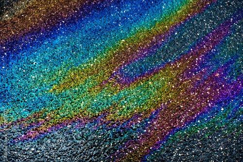 rainbow effect on petrol on the asphalt