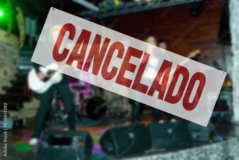 Spanish inscription CANCELED. Concert is cancelled. Restrictions, safety, health and precaution concept