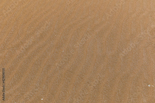 Texture of beach sand on th...