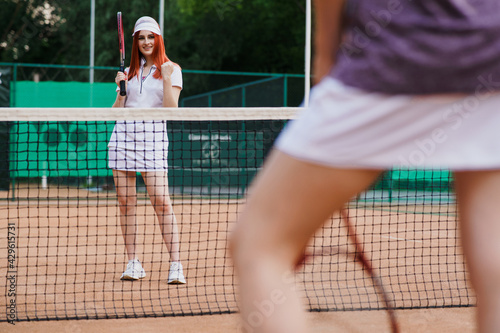 Two girls tennis players on court © taras.chaban