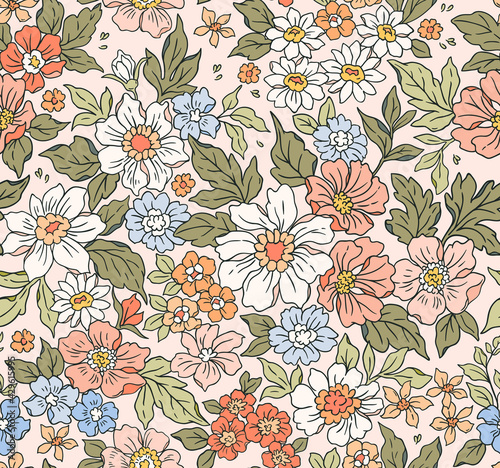 Vintage seamless floral pattern. Liberty style background of small pastel colorful flowers. Small flowers scattered over a beige background. Stock vector for printing on surfaces. Realistic flowers.