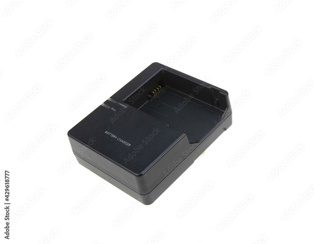 camera battery charger isolated on white background camera battery charger isolated on white background