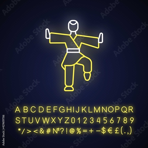Kung Fu neon light icon. Martial arts training. Karate class. Traditional fighting. Outer glowing effect. Sign with alphabet, numbers and symbols. Vector isolated RGB color illustration