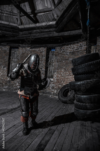 A knight in armor in a castle