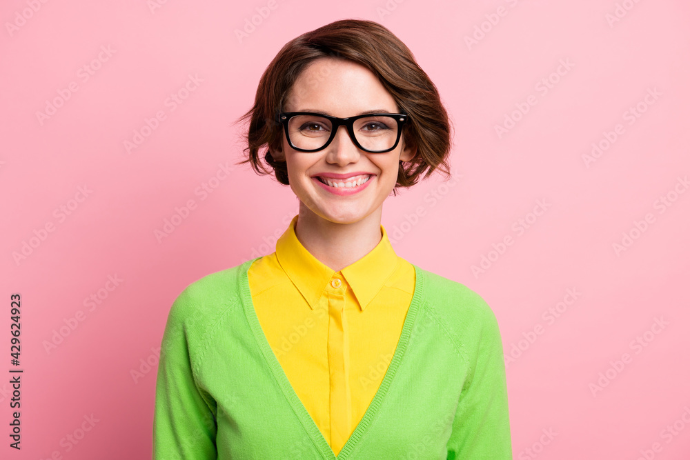 Photo of charming adorable young lady dressed yellow shirt glasses smiling isolated pastel pink color background