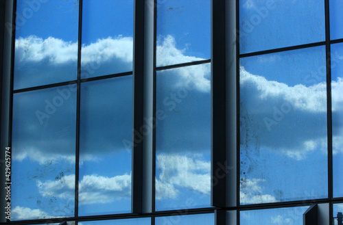 reflection of clouds in the window