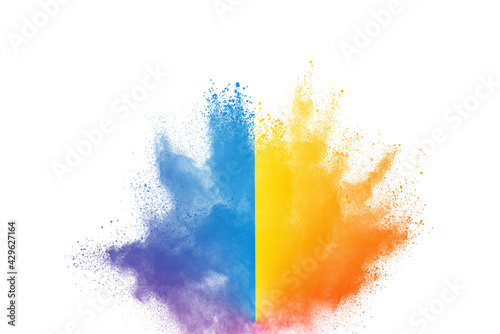 White powder explosion isolated on black background. White dust particles splash.Color Holi Festival.