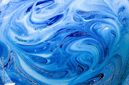 abstract background beautiful stains of blue paint © Viktoriia Kolosova