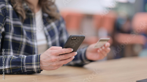 Female Hands Making Online Payment on Smartphone, Close up