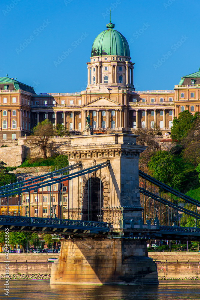 Morning in Budapest, Chain Bridge against the background of the Buda Fortress, reflected in the water, cityscape