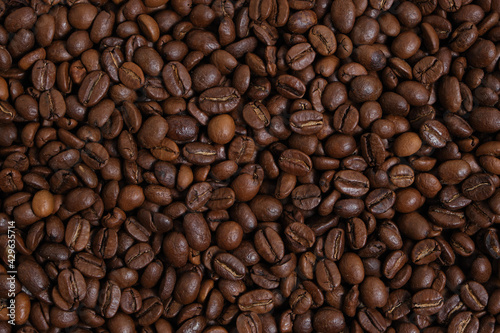 Coffee beans background close up.