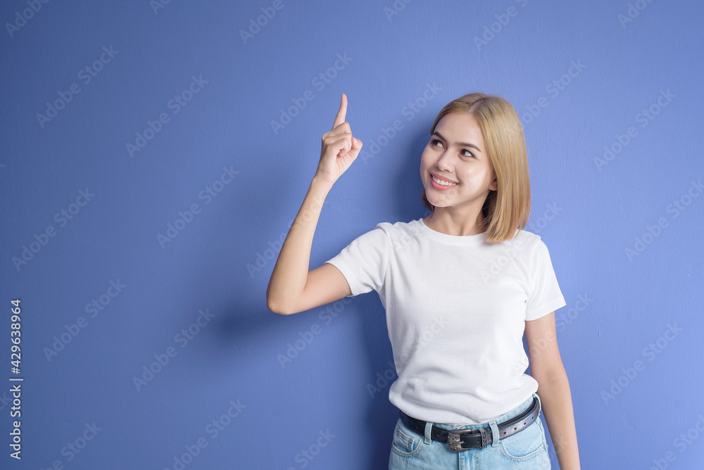 portrait of short blonde hair woman in studio portrait of short blonde hair woman in studio