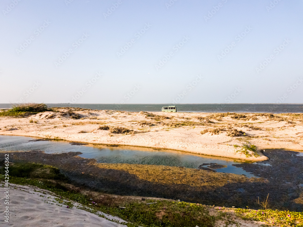 The white sand dunes on a beach off the coast of the island of Dhanushkodi near the town of Rameswaram in Tamil Nadu, India.